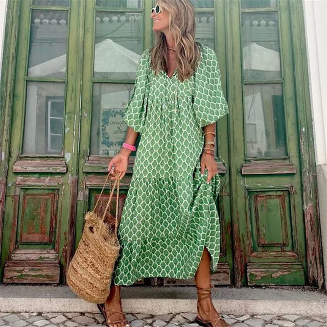 Aviana | Boho Maxi Kleid mit Blumenprint – V‑Ausschnitt & Halbarm im Ibiza‑Look