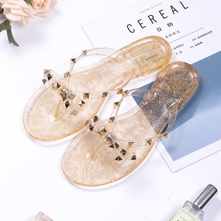 Sherica | Flache Sommerschlappen mit Metall-Detail – stilvoll & bequem